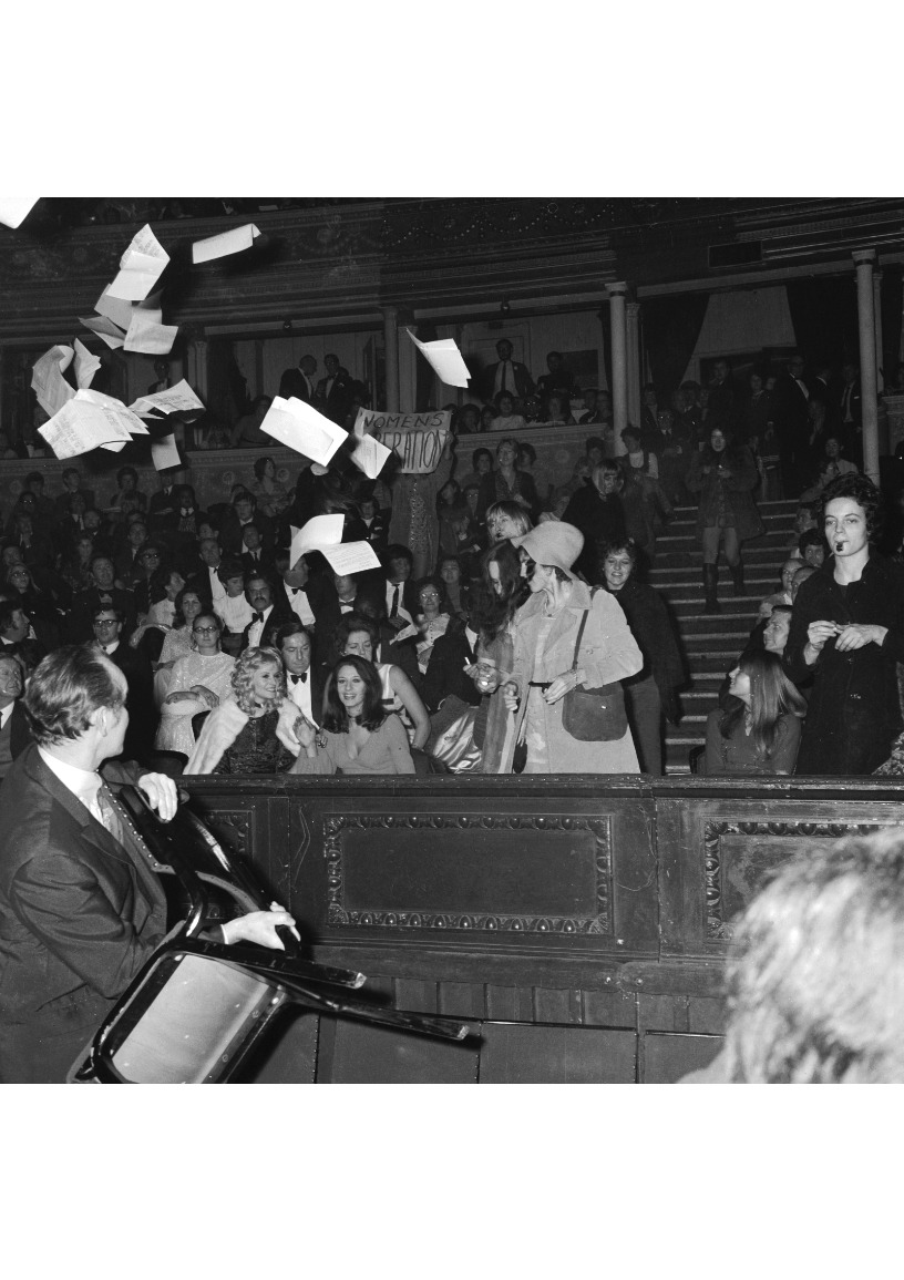 21st November 1970:  The Miss World contest causes a feminist storm as demonstrators invade the Royal Albert Hall where the contest was held. Protestors fired ink at spectators and let off stink bombs in scenes resembling a school assembly. The unruly ladies were eventually expelled from the hall by security guards and policemen.  (Photo by Leonard Burt/Central Press/Getty Images)